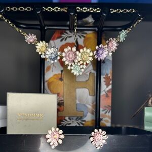 Flower jewelry set with earrings and necklace. NIB